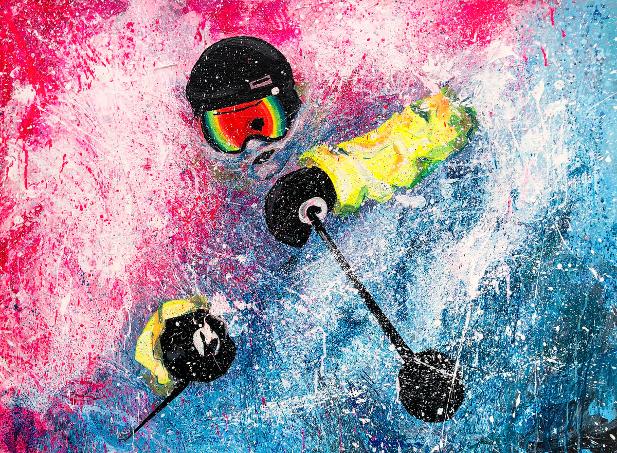 Power of Powder: A skier seen from above, red goggles and a yellow glove, poles reaching through a spray of pink and blue snow.