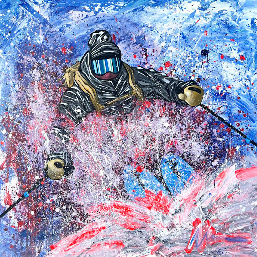 Stomped: A skier in blue goggles landing in a burst of red, white and blue spray.